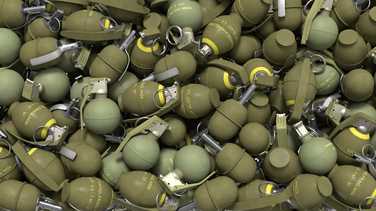High-resolution image of olive green military hand grenades in a pile, showcasing industrial design.
